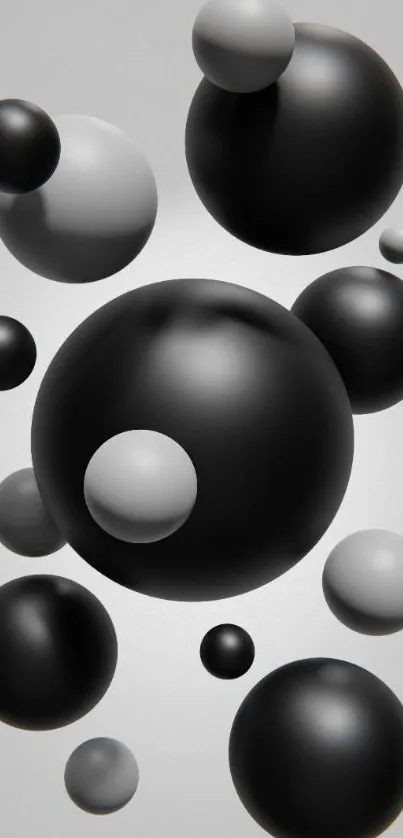 3D black and gray spheres floating on a gray background.