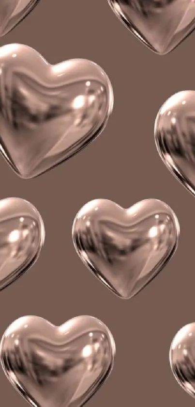 3D glass hearts on a brown background.