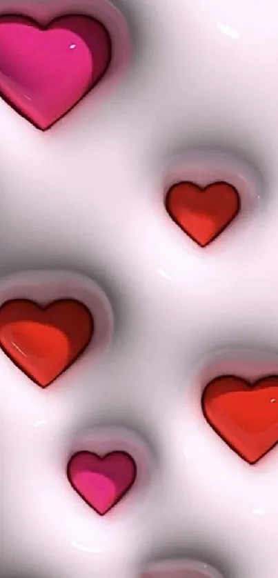 3D wallpaper with red and pink hearts.