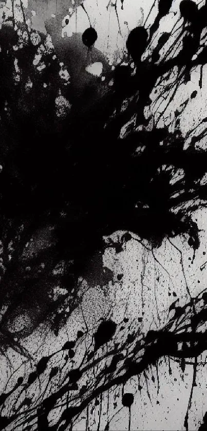 Abstract black ink splash design on a mobile wallpaper.