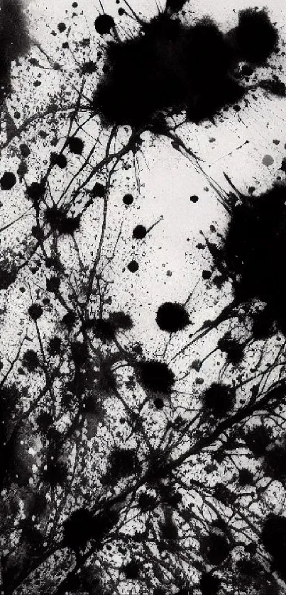 Abstract black ink splatter mobile wallpaper with artistic design.