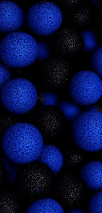 Abstract wallpaper with blue and black textured spheres.