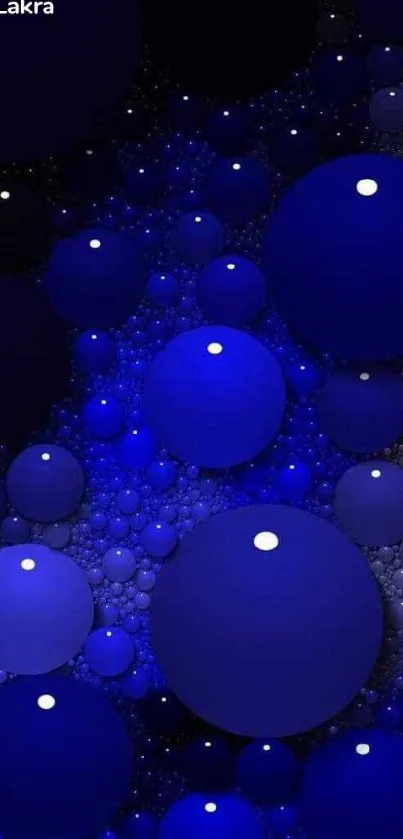 Bright blue bubbles on a dark abstract background.