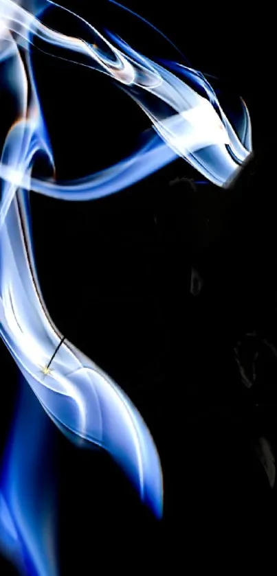 Abstract blue flame with smoke on a black background.