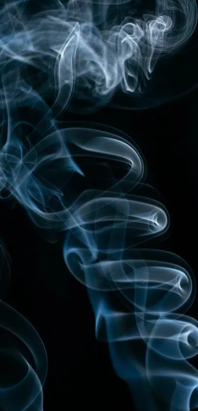 Abstract blue smoke swirls on dark background wallpaper.