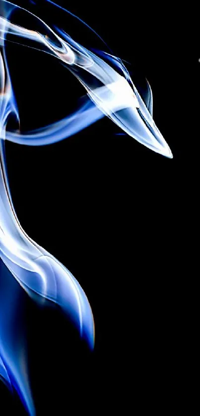 Abstract blue smoke art on black background.