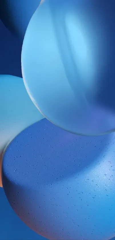 Abstract blue spheres wallpaper with glossy and soft gradient textures.