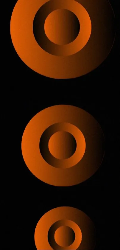 Abstract orange circles on black background mobile wallpaper.