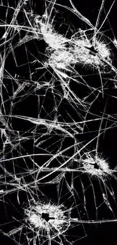 Abstract cracked glass on a black background wallpaper.