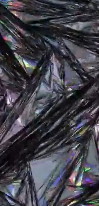 Abstract crystalline texture with iridescent highlights on a gray background.
