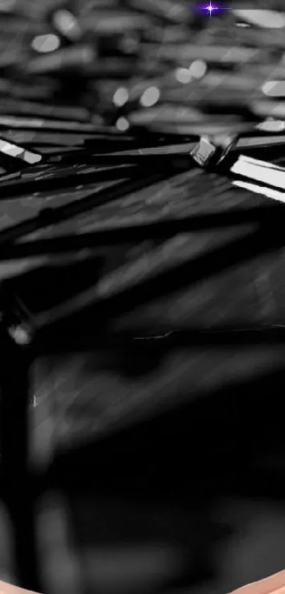 Dark geometric abstract wallpaper with light accents.