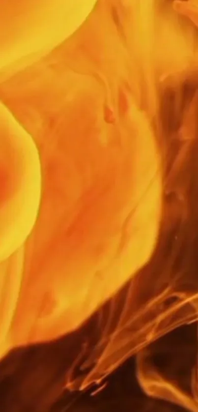 Abstract orange and yellow fluid wallpaper with fiery patterns.