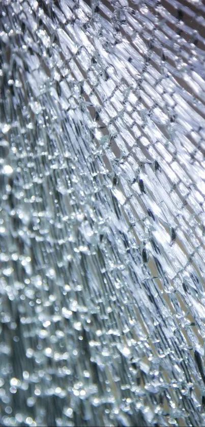 Abstract glass shards reflecting light in a modern wallpaper design.