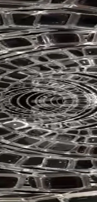 Intricate abstract glass spiral design with reflective surfaces.