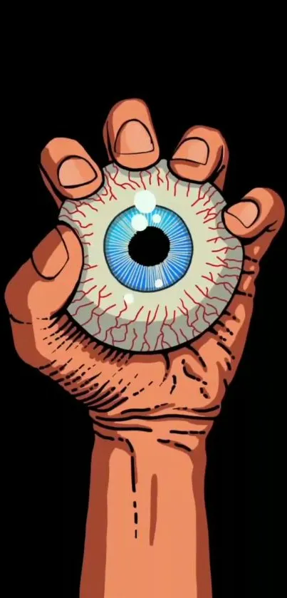 Hand gripping a realistic blue eye on a black background.