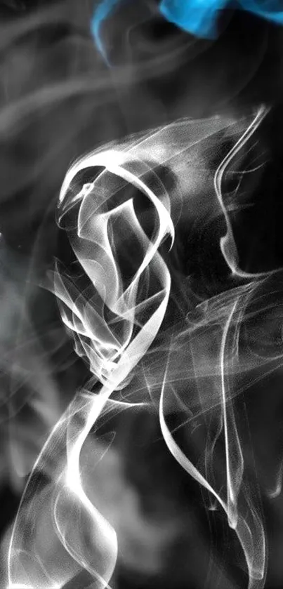 Abstract smoke art wallpaper with white and blue wisps against a dark background.