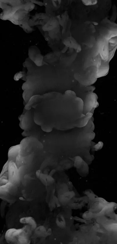 Abstract gray smoke design on black background.