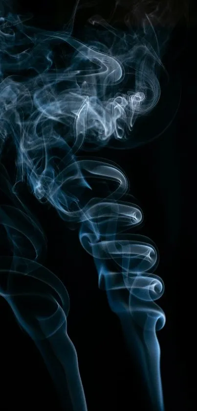 Intricate blue smoke pattern on a black background wallpaper.