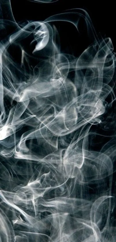 Abstract smoke pattern on black background wallpaper.