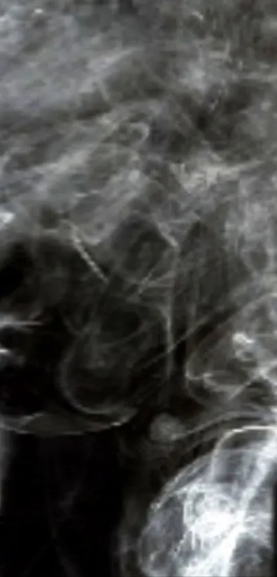 Abstract gray smoke swirling on a black background, creating a modern mobile wallpaper.