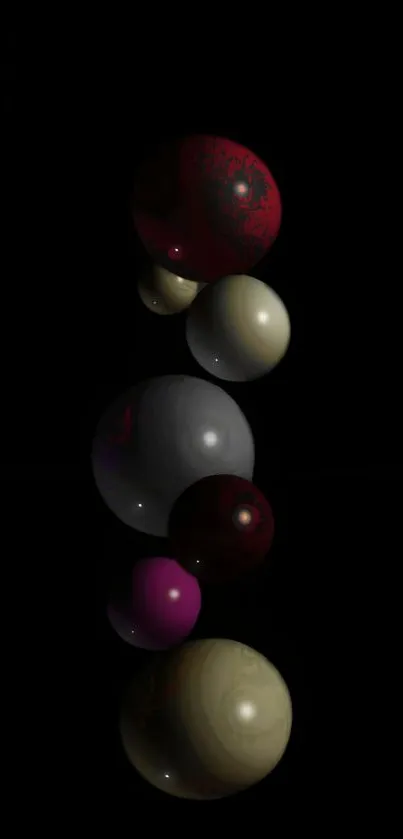 Abstract spheres on a black background for mobile wallpaper.