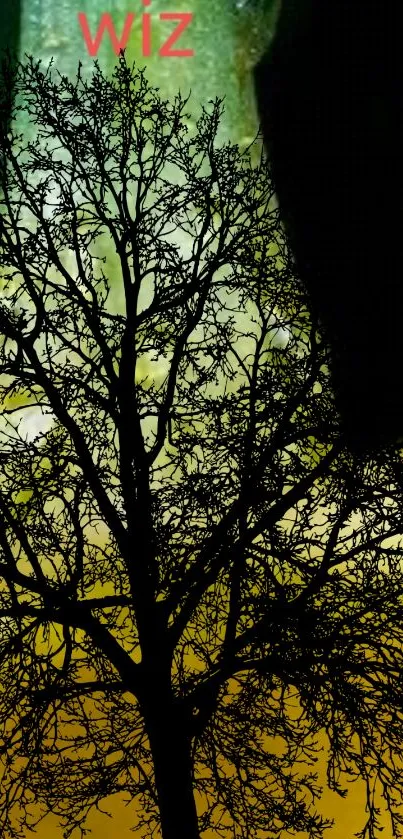 Tree silhouette on a vibrant abstract background in yellow and green.