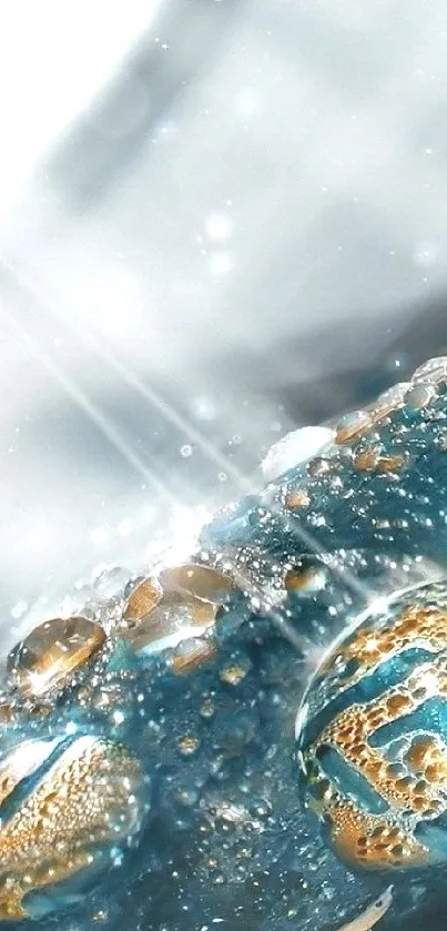 Abstract blue water droplets with gold details on a mobile wallpaper.