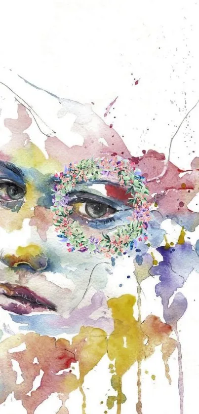 Abstract watercolor face with colorful splashes on white background.