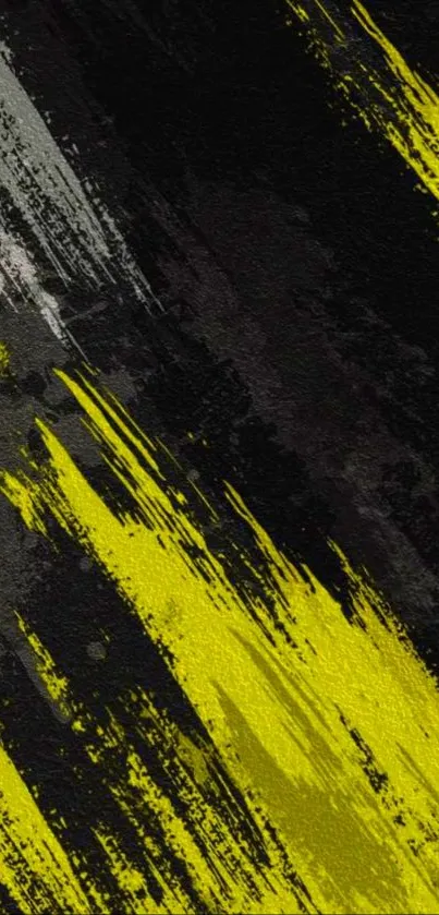 Abstract wallpaper with yellow brush strokes and dark background texture.