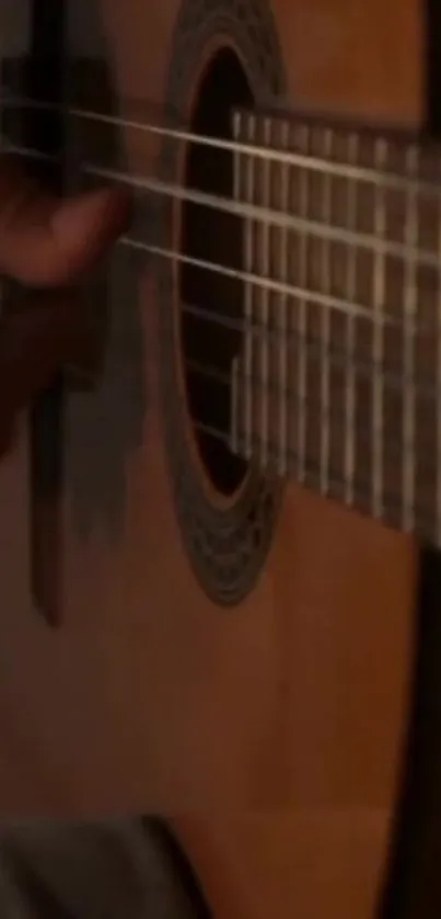 Close-up of guitar strings with warm brown tones for a musical ambiance wallpaper.