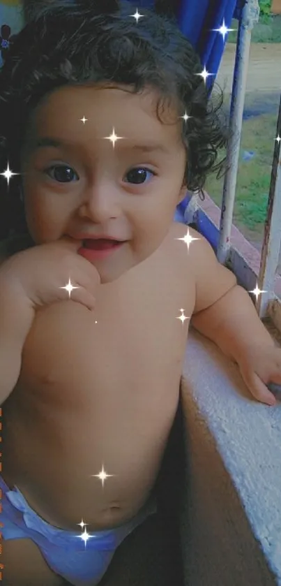 Adorable baby standing by a window with a curious expression.