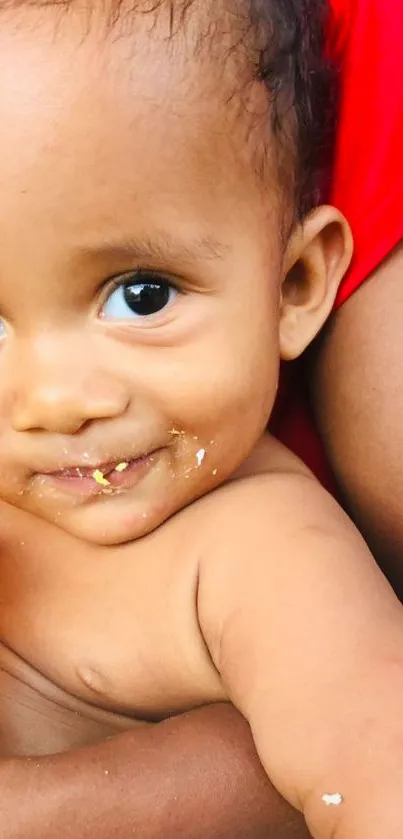 Adorable baby with sweet expression and close-up smile in vibrant colors.