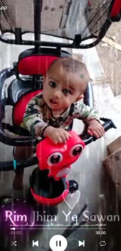 Adorable baby on a tricycle with a gray background