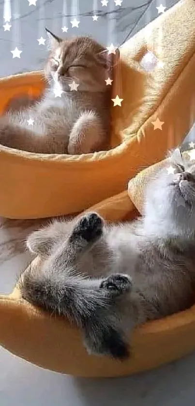 Two kittens sleeping in plush banana beds on a marble floor.