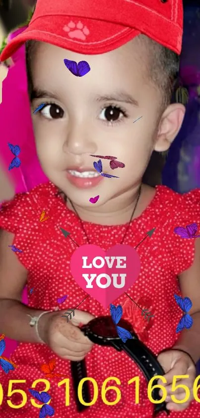 Cute child in red dress with butterflies.