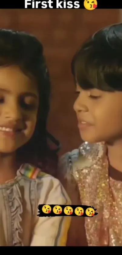 Two young children sharing a cute moment on screen.