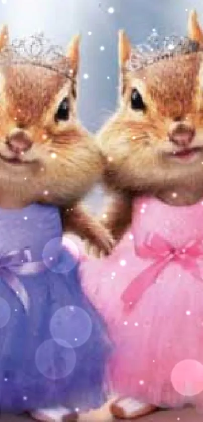 Two adorable chipmunks in tutus, one in purple and one in pink, wearing tiaras.