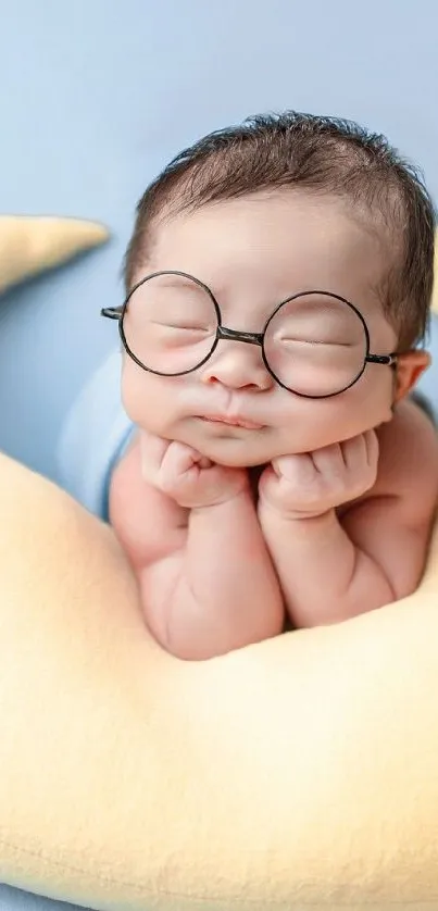 Adorable sleeping baby on a crescent moon with stars.