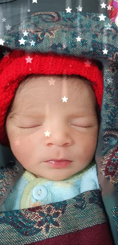 Newborn baby sleeping with a red hat and star overlay effects.