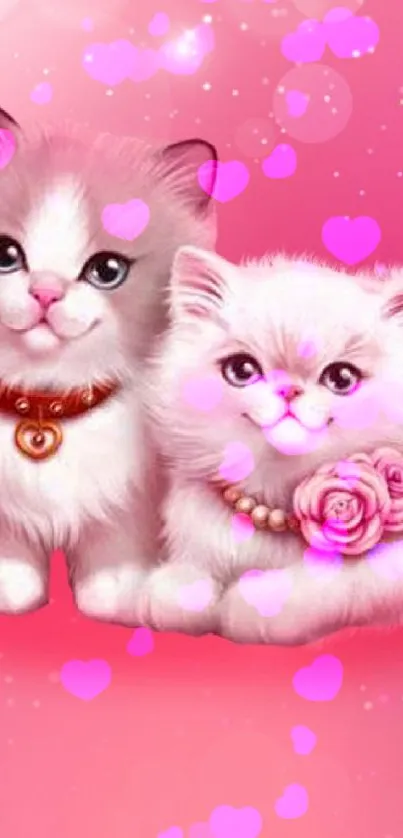 Adorable pink kittens with floral accents on a mobile wallpaper background.