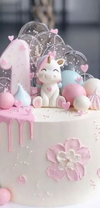 Cute unicorn birthday cake with pastel decorations.