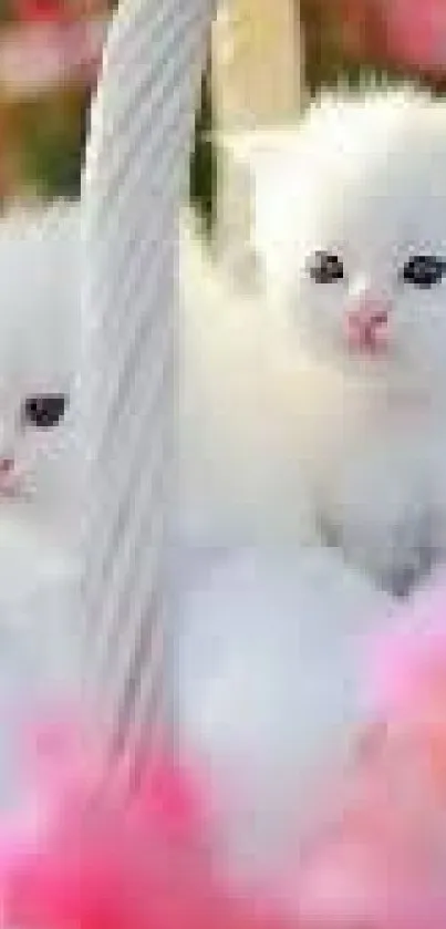 Adorable white kittens in a basket surrounded by pink flowers.