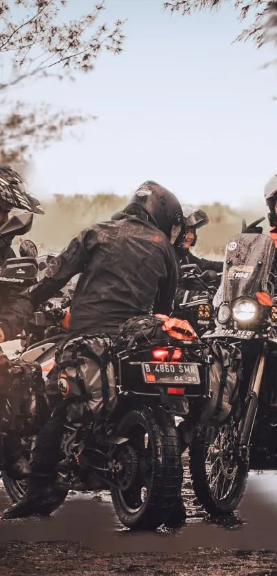 Group of bikers riding in the rain.