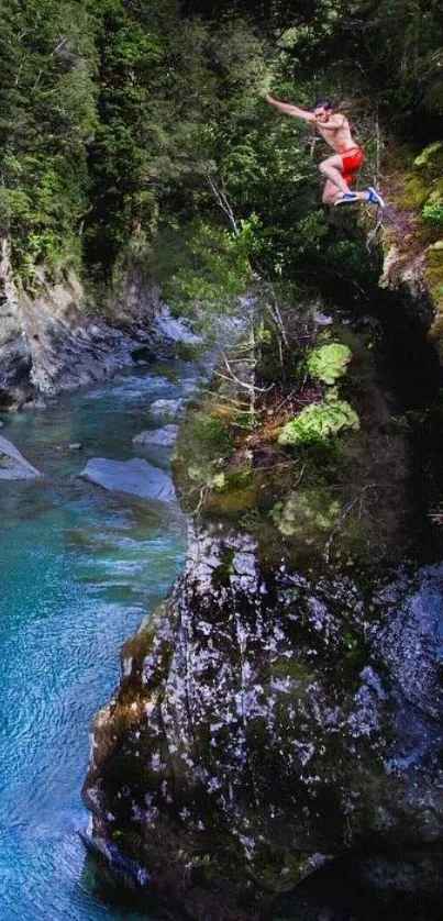 Cliff diver leaps into turquoise river with lush greenery.