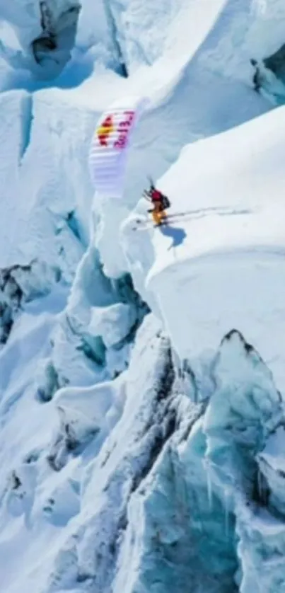 Snowy mountain paraglider in action.