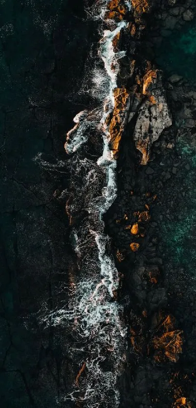 Aerial view of rocky shoreline with ocean waves crashing along the coast.