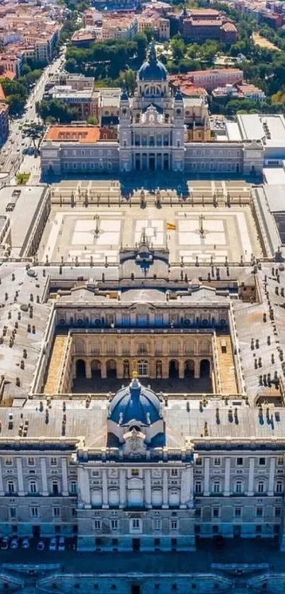 Aerial view of a historic European palace, showcasing intricate architecture.