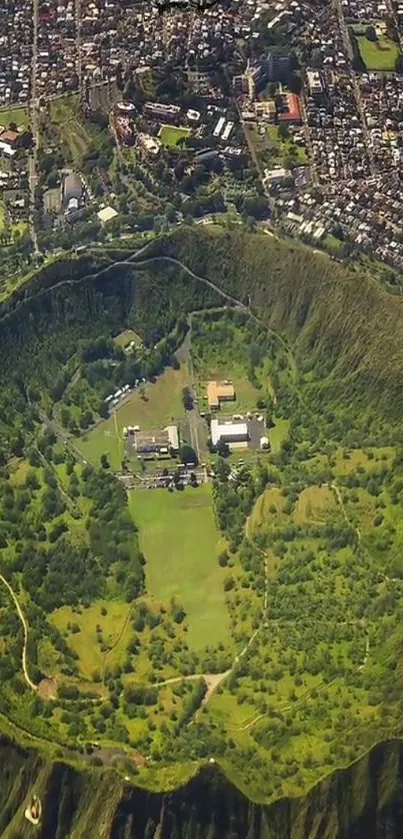 Aerial photo of a lush, green crater beside a bustling cityscape.