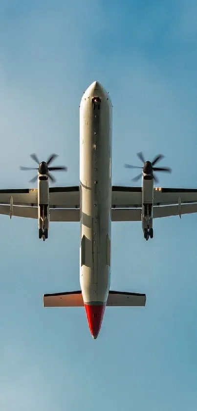 Airplane soaring through a blue sky with scattered clouds.