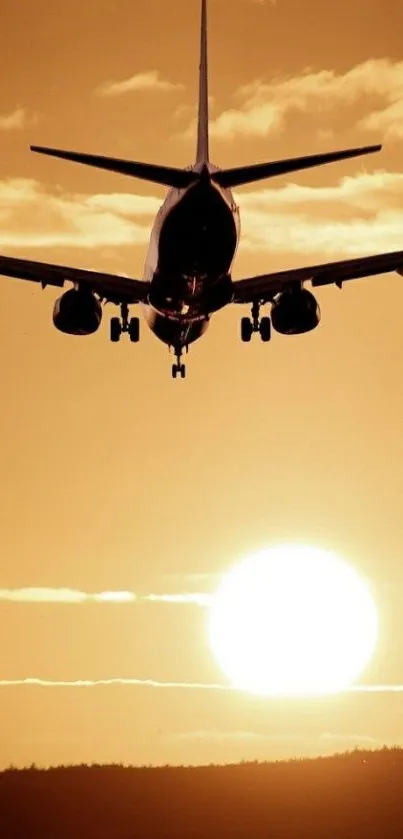 Airplane silhouetted against a golden sunset sky.